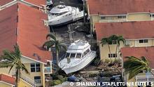An aerial view of damaged boats and buildings after Hurricane Ian caused widespread destruction in Fort Myers, Florida, U.S., September 29, 2022. REUTERS/Shannon Stapleton 