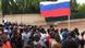 Des jeunes brandissant des drapeaux russes à Ouagadougou, le 30 septembre 2022 Des jeunes brandissant des drapeaux russes à Ouagadougou, le 30 septembre 2022