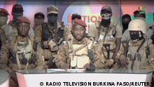 Kiswensida Farouk Aziz Sorgho announces on television that army captain Ibrahim Traore has ousted Burkina Faso's military leader Paul-Henri Damiba and dissolved the government and constitution