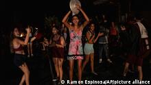 People protest asking for the restoration of electrical service after four days of blackout due to the devastation of Hurricane Ian in Bacuranao, Cuba, Friday, Sept. 30, 2022. (AP Photo/Ramon Espinosa)