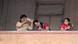 Women seen standing on the balcony as they take photos and record videos with their smartphones in Mumbai Women seen standing on the balcony as they take photos and record videos with their smartphones in Mumbai