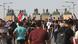 Security forces block the Republic Bridge leading to the Green Zone with concrete barriers as hundreds of Iraqis hold banners and shout slogans as they gather for a demonstration demanding justice for demonstrators killed during the 2019 revolt dubbed the "October Revolution", at the Tahrir Square in Baghdad, Iraq on October 01, 2022. Security forces block the Republic Bridge leading to the Green Zone with concrete barriers as hundreds of Iraqis hold banners and shout slogans as they gather for a demonstration demanding justice for demonstrators killed during the 2019 revolt dubbed the "October Revolution", at the Tahrir Square in Baghdad, Iraq on October 01, 2022.