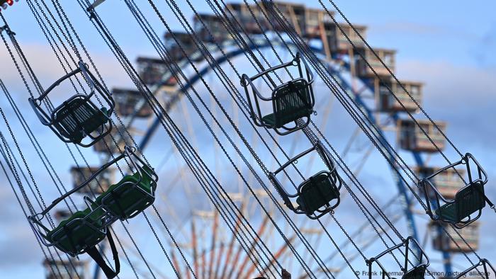 An empty swing carousel turns 