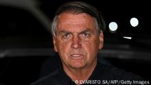 Brazilian President and re-election candidate Jair Bolsonaro speaks after learning the results of the legislative and presidential election in Brasilia, on October 2, 2022. - Brazil's bitterly divisive presidential election will go to a runoff on October 30, electoral authorities said Sunday, as incumbent Jair Bolsonaro beat expectations to finish a relatively close second to front-runner Luiz Inacio Lula da Silva. Lula, the veteran leftist seeking a presidential comeback, had 48.1 percent of the vote to 43.5 percent for the far-right President, with 98 percent of polling stations reporting, according to official from the Superior Electoral Tribunal. (Photo by EVARISTO SA / AFP) (Photo by EVARISTO SA/AFP via Getty Images)