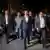 Kiril Petkov walking with other members of his party
