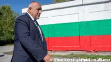 Former Bulgarian Prime Minister Boyko Borisov leaves the polling station after casting his ballot in the town of Bankya, Bulgaria, Sunday, Oct. 2, 2022. Bulgarians on Sunday cast their ballots in a general election marked by a raging war nearby, political instability, and economic hardships in the European Union’s poorest member. (AP Photo/Visar Kryeziu)
