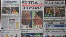 National newspapers report on the results of the legislative and presidential election, a day after the general vote in Brazil, in Rio de Janeiro, on October 3, 2022. - Brazil's bitterly divisive presidential election is headed for a runoff on October 30 as incumbent Jair Bolsonaro beat expectations to finish a closer-than-expected second to front-runner Luiz Inacio Lula da Silva. (Photo by Carl DE SOUZA / AFP) (Photo by CARL DE SOUZA/AFP via Getty Images)