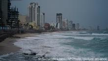 03/10/2022***
Skies are dark along the coast of Mazatlan, Mexico, early Monday, Oct. 3, 2022, as Hurricane Orlene approaches. The storm is heading for Mexico's northwest Pacific coast between Mazatlan and San Blas. (AP Photo/Fernando Llano)