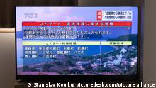 Japanese national broadcaster NHK warns about possible impact areas of a launched North Korean ballistic missile on the morning of October 4, 2022. - 20221004_PD0034