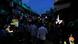 People walk through a dark street after power failure in Dhaka, Bangladesh People walk through a dark street after power failure in Dhaka, Bangladesh
