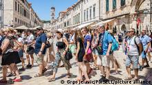 Tourists are seen sightseeing in the Old Town of Dubrovnik, Croatia on July 13, 2022. Photo: Grgo Jelavic/PIXSELL