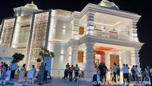 Visitors stand outside the newly inaugurated Hindu Temple in Dubai, United Arab Emirates, October 4, 2022. REUTERS/Rula Rouhana