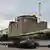 Kernkraftwerk Saporischschja mit russischem Kampffahrzeug vor dem Gelände
