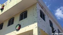 Bullet holes the wall of the Municipal Palace of San Miguel Totolapan in Guerrero state