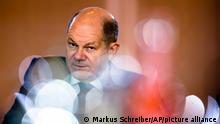 German Chancellor Olaf Scholz arrives for the weekly cabinet meeting of the German government at the chancellery in Berlin, Germany, Wednesday, Oct. 5, 2022. (AP Photo/Markus Schreiber)