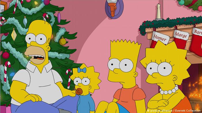 THE SIMPSONS, from left: Homer Simpson (voice: Dan Castellaneta)...