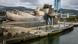 A view of the Guggenheim Museum Bilbao from one side. A view of the Guggenheim Museum Bilbao from one side.