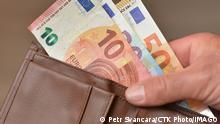 Prices of energy - electricity and gas - for households and businesses may rise up in the autumn at the latest non-fixed prices of products, according to analysts in Czech Republic. Illustration photo. Pictured wallet with Euro bank notes, money. CTKxPhoto/PetrxSvancara CTKPhotoF202210050341601 PUBLICATIONxNOTxINxCZExSVK
