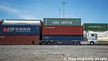 ARCHIV 2018 *** DUISBURG, GERMANY - JULY 16: Containers from China are seen in the Duisburg port (DIT Duisburg Intermodal Terminal) on July 16, 2018 in Duisburg, Germany. Approximately 25 trains a week use the Silk Road connection between Duisburg and the Chinese cities of Congqing and Yiwu. Several European countries use the Duisburg China rail hub for both importing goods from China and exporting goods to China. (Photo by Maja Hitij/Getty Images)
