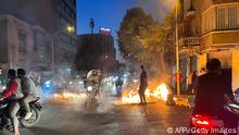 TOPSHOT - A picture obtained by AFP outside Iran, reportedly shows objects lit on fire in the capital Tehran, on October 8, 2022. - Iran has been torn by the biggest wave of social unrest in almost three years, which has seen protesters, including university students and even young schoolgirls chant Woman, Life, Freedom. (Photo by AFP) (Photo by -/AFP via Getty Images)