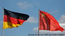 2017, Berlin****
The German and Chinese flags fly prior to the arrival of Prime Minister Li Keqiang for talks at the Chancellery in Berlin on May 31, 2017. (Photo by Odd ANDERSEN / AFP) (Photo by ODD ANDERSEN/AFP via Getty Images)