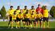 Borussia Dortmund's U19s pose for a team photo with a "United Against Racism" scarf ahead of the UEFA Youth League game against Sevilla Borussia Dortmund's U19s pose for a team photo with a "United Against Racism" scarf ahead of the UEFA Youth League game against Sevilla