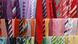 Many colorful ties are hung side by side. Many colorful ties are hung side by side.