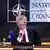 NATO Secretary General Jens Stoltenberg looks down, concerned