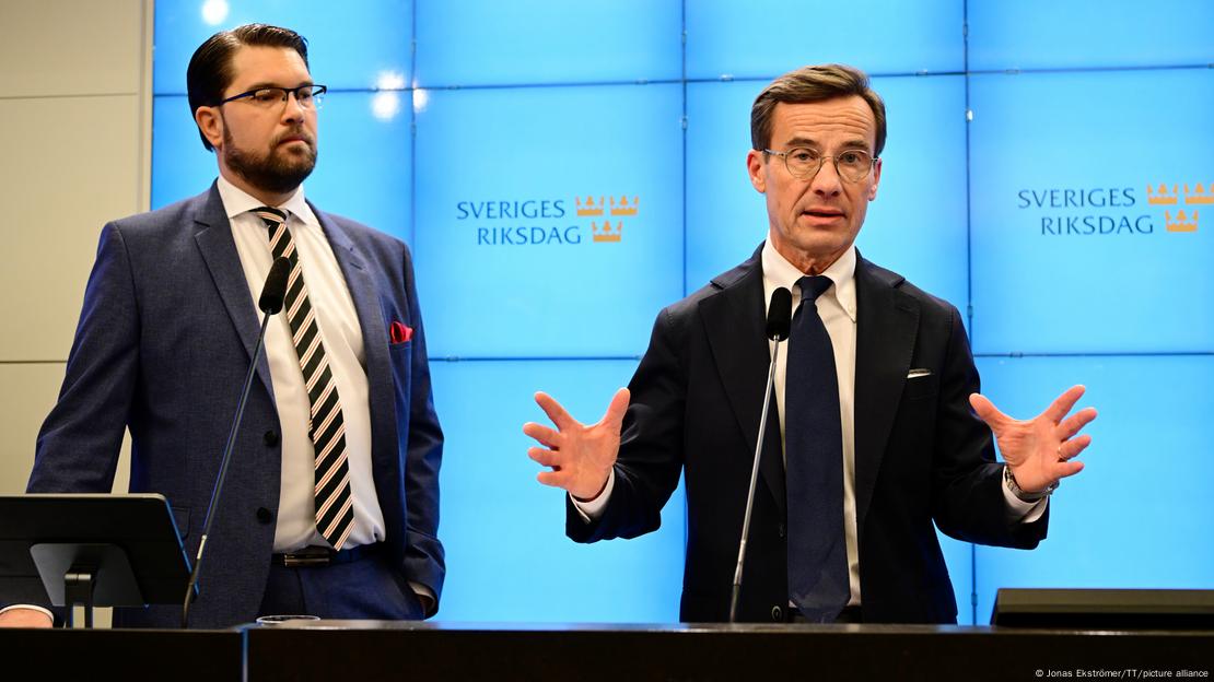 Лидерот на Шведските демократи, Џими Окесон (л.) и премиерот на Шведска, Улф Кристерсон (д.)