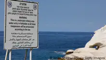 7.10.2022****
A sign written in Hebrew, English and Arabic designating a military area, stands overlooking the Mediterranean Sea in Israel's Rosh Hanikra, at the border between Lebanon and Israel, on October 7, 2022. - Israel said on October 6 that it will reject Lebanon's amendments to a US-drafted proposal on resolving a long-running maritime border dispute over gas-rich waters off the countries' Mediterranean coasts. Lebanon and Israel have no diplomatic relations and their land border is patrolled by the United Nations. The two sides are technically still at war. (Photo by JALAA MAREY / AFP) (Photo by JALAA MAREY/AFP via Getty Images)