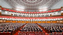 In this photo released by Xinhua News Agency, delegates attend a preparatory meeting ahead of the 20th National Congress of the Communist Party of China held at the Great Hall of the People in Beijing on Saturday, Oct. 15, 2022. China on Sunday is opening a twice-a-decade party conference at which leader Xi Jinping is expected to receive a third five-year term that breaks with recent precedent and establishes himself as arguably the most powerful Chinese politician since Mao Zedong. (Huang Jingwen/Xinhua via AP)