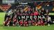 Alajuelense players celebrate winning the league with the trophy and their medals Alajuelense players celebrate winning the league with the trophy and their medals