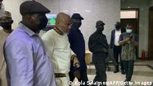 Men of the Nigeria State Secret Police (SSS) escorts Indigenous People of Biafra (IPOB), Nnamdi Kanu (2nd L), outside the Federal High Court during the trial of the IPOB leader who is facing a 7-count amended charge on alleged treasonable felony and terrorism at the Federal High Court in Abuja, Nigeria, on October 21, 2021. - A high-profile case against a Nigerian separatist accused of terrorism and treason was adjourned on October 21, 2021, lawyers said, after a court appearance under heavy security in the capital Abuja.
Nnamdi Kanu, 53, leader of the proscribed Indigenous People of Biafra (IPOB) group, which wants a separate state for the ethnic Igbo people in the southeast, was arrested abroad in June and brought back to Nigeria to face trial. (Photo by Kola Sulaimon / AFP) (Photo by KOLA SULAIMON/AFP via Getty Images)