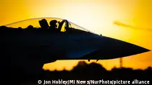 Royal Air Force Eurofighter Typhoon pilot gives the 'OK' signal ahead of takeoff RAF Coningsby, UK against a sunset on 20 July 2020. (Photo by Jon Hobley/MI News/NurPhoto)