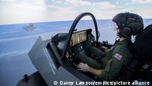 F-35 Lightning II jets. File photo dated 27/10/17 of Royal Air Force Squadron Leader Andy Edgell, the UK's lead test pilot, using a specialist fighter jet simulator at BAE Systems in Warton, Lancashire. Issue date: Monday October 30, 2017. The £2 million facility enables engineers and pilots to experience flying and landing the F-35B Lightning II from the HMS Queen Elizabeth aircraft carrier. See PA story DEFENCE F35 Simulator. Photo credit should read: Danny Lawson/PA Wire URN:33503905
