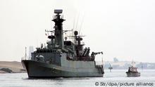 epa01140455 The German Navy ship, Spessart , makes its way as part of a convoy of five NATO warships from Netherlands, the US, Canada and Denmark, through the Suez Canal from the Red Sea, 06 October 2007 to take part in war exercises in the Mediterranean Sea. The NATO ships recently completed naval manuevers off the coast of Africa and the Arabian Sea. EPA/STR