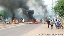 Smoke erupts from tyres set on fire as people protest in N'Djamena, Chad, October 20, 2022 in this picture obtained from social media. Juda Allahondoum - Le Visionnaire/via REUTERS THIS IMAGE HAS BEEN SUPPLIED BY A THIRD PARTY. MANDATORY CREDIT. NO RESALES. NO ARCHIVES.