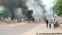 Smoke erupts from tyres set on fire as people protest in N'Djamena, Chad, October 20, 2022 in this picture obtained from social media. Juda Allahondoum - Le Visionnaire/via REUTERS THIS IMAGE HAS BEEN SUPPLIED BY A THIRD PARTY. MANDATORY CREDIT. NO RESALES. NO ARCHIVES.