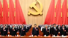 In this photo released by Xinhua News Agency, Chinese Communist Party leaders. Including from left Zhao Leji,, Wang Yang, Premier Li Keqiang, President Xi Jinping, Former President Hu Jintao, Li Zhanshu and Wang Huning attend the opening ceremony of the 20th National Congress of the Communist Party of China at the Great Hall of the People in Beijing, Oct. 16, 2022. China on Sunday opens a twice-a-decade party conference at which leader Xi Jinping is expected to receive a third five-year term that breaks with recent precedent and establishes himself as arguably the most powerful Chinese politician since Mao Zedong.(Li Xueren/Xinhua via AP)