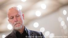 22.05.2018, Nordrhein-Westfalen, Düsseldorf: Rainer Schaller, Fitnessunternehmer und damaliger Inhaber der Loveparade-Veranstalterin Lopavent, steht in einem Gerichtssaal der Außenstelle des Landgerichts Duisburg. Hier wird der Loveparade-Prozess fortgesetzt. Am 24. Juli 2010 starben bei der Technoparade in Duisburg 21 junge Menschen in einem Gedränge. Foto: Rolf Vennenbernd/dpa ++