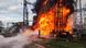 Ukrainian rescuers responding to a fire at an infrastructure object hit by shelling
