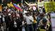 Manifestantes marchan en Bogotá contra las reformas tributarias y otras iniciativas propuestas por el gobierno del presidente Gustavo Petro. Manifestantes marchan en Bogotá contra las reformas tributarias y otras iniciativas propuestas por el gobierno del presidente Gustavo Petro.