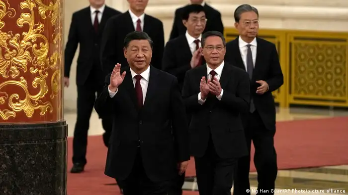 目前王沪宁在中共政治局排名第四。