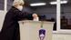 A woman casts her vote in round one of the presidential election, Ljubljana, Slovenia, October 23, 2022 A woman casts her vote in round one of the presidential election, Ljubljana, Slovenia, October 23, 2022