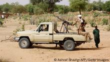 Sudanese security forces ensure security during a rally upon the arrival of Sudanese president for a visit in al-Geneina, the capital of the West Darfur state, on April 2, 2016.
Omar al-Bashir started a tour of Darfur on April 1, 2016 ahead of a referendum on whether to keep the conflict-torn western area as five states or to create one united region. Bashir -- who is wanted over war crimes allegations in Darfur -- said he is holding the vote under a 2011 agreement between Khartoum and some of the rebel groups that have been battling his forces for more than a decade. AFP / ASHRAF SHAZLY (Photo credit should read ASHRAF SHAZLY/AFP via Getty Images)