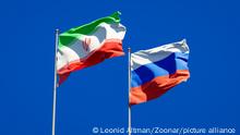 Beautiful national state flags of Iran and Russia together at the sky background. 3D artwork concept.