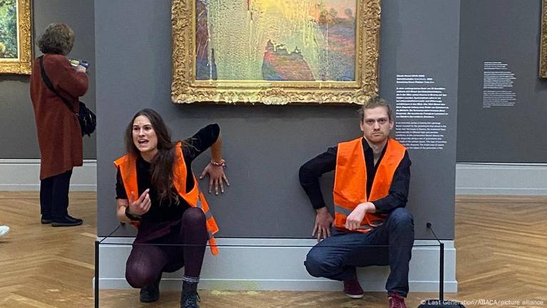 Climate activists glue their hands to the frames of Goya