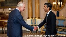 King Charles III welcomes Rishi Sunak during an audience at Buckingham Palace, London, where he invited the newly elected leader of the Conservative Party to become Prime Minister and form a new government, Tuesday, Oct. 25, 2022. (Aaron Chown/Pool photo via AP)