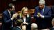 Italy's Prime Minister Giorgia Meloni reacts as Deputy Prime Minister and Infrastructure Minister Matteo Salvini and Foreign Minister Antonio Tajani applaud Italy's Prime Minister Giorgia Meloni reacts as Deputy Prime Minister and Infrastructure Minister Matteo Salvini and Foreign Minister Antonio Tajani applaud