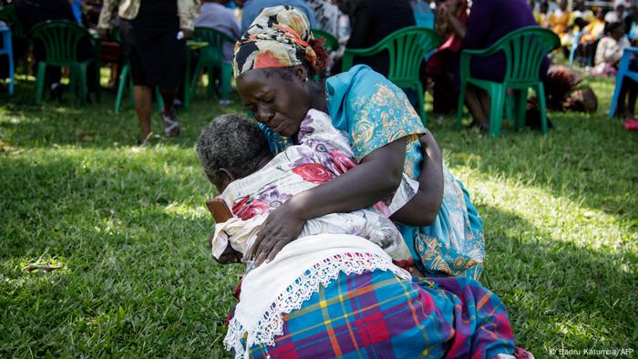 Relatives of the deceased console themselves in the courtyards of Salama School for the Blind, after the fire that killed a number of students.